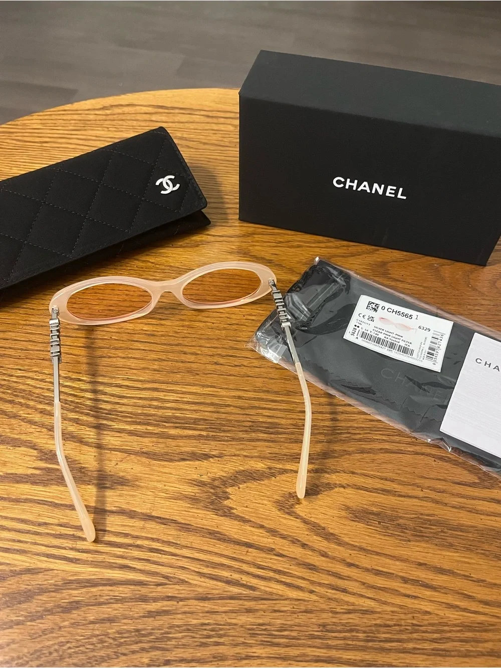CHANEL Translucent Pale Pink Oval Sunglasses